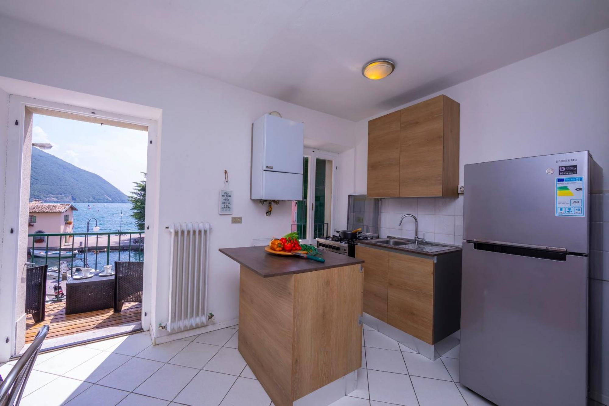 Dogana Best Lake View - Happy Rentals 토르볼레 외부 사진
